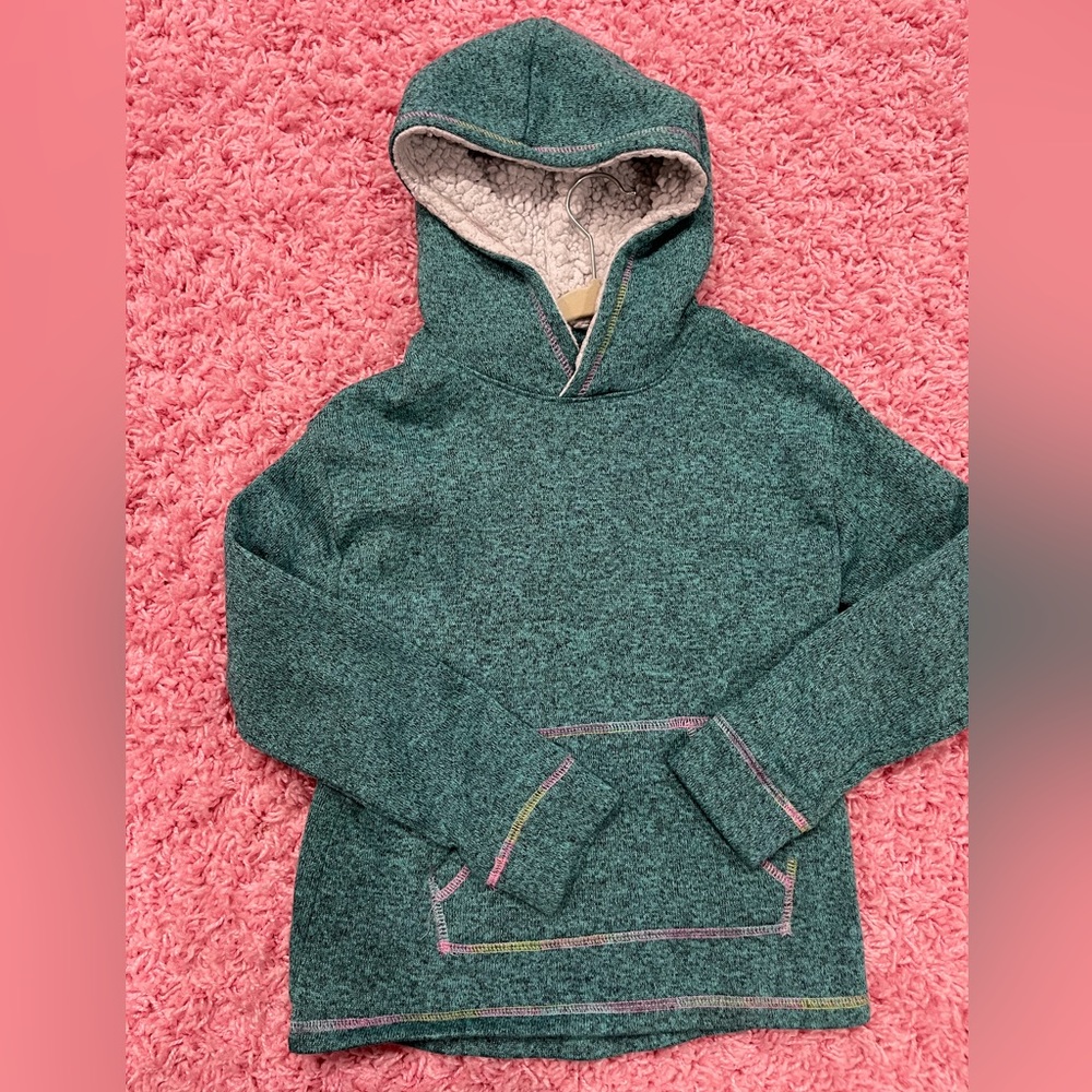 Super soft green hoodie with rainbow stitching